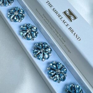 Prydnadsknapp i ljusblått